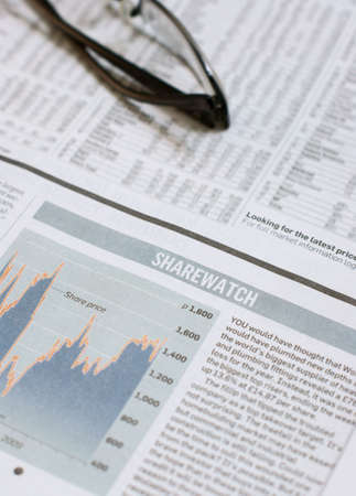 Share prices in the newspaperの写真素材