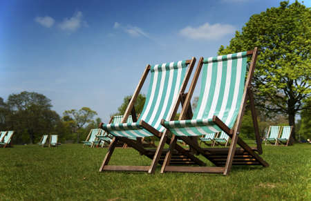 Deckchairs in Hyde Park, London with selected focusの写真素材