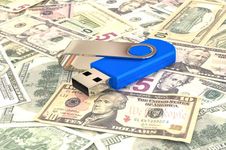 USB stick on a bunch of dollars