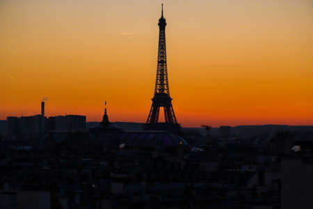 Eiffel tower at sunset from Haussmann Rooftopの写真素材