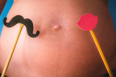 Pregnant woman with original guess girl or boy questionの写真素材