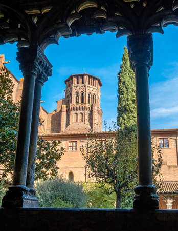 Cloister of Augustins with an arch frame on a sunny day in Toulouse France