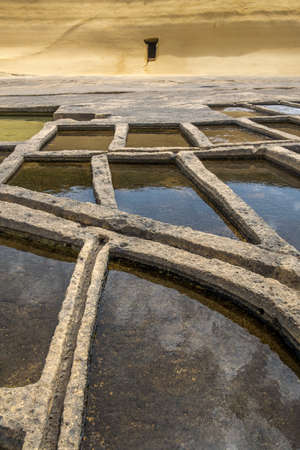 Salt pans located near Qbajjar on the maltese Island of Gozo. Detailed viewの写真素材