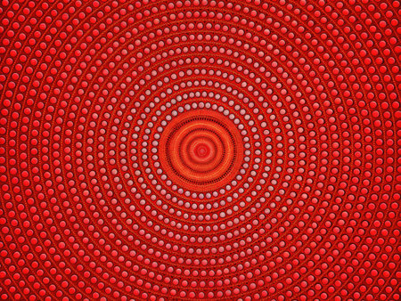 Concentric red circles form a mesmerizing hypnotic pattern.の素材
