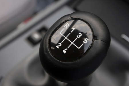 Picture of car gear shifter in macro inside cabin