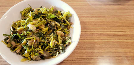 Indonesian cuisine made from Papaya Flower called Sayur Bunga Pepaya in Indonesian language is...