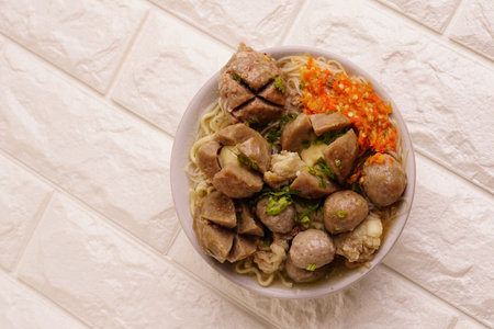 Delicious beef meatball soup tasty and healthy soup cooking also known as Bakso in Indonesia with fresh chili pasteの写真素材