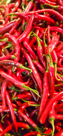 Red hot chilli peppers texture background, close up, A backdrop of Red hot chilli peppers, Street...