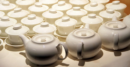 collections of party and catering ceramics china bone and party tableware cups and pots good for cooking book and other cooking and catering multimedia content creationの写真素材