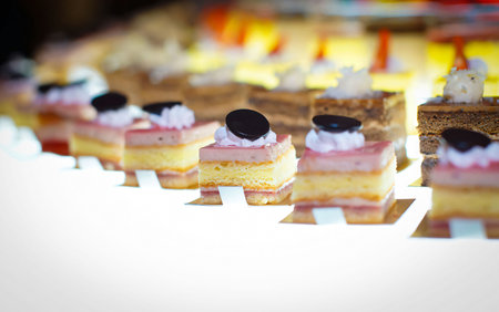 Beautiful multicolored decorated baked sweet tasty party cakes or catering cakes for party, bar...