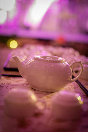 elegant and traditional tea set teapot for serving and drinking coffee or tea drink ware made of ceramics as part table ware good cooking recipe book or multimedia content creationの写真素材