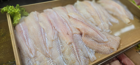 Fish market fresh produce on display on wet market in Asia, fisherman market displays seafood for...