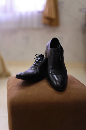 Pair of very stylish gentleman shoes glossy black shoes very luxurious and expensive shoes,...