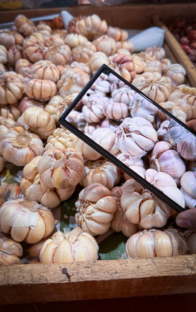 colorful assortment of kitchen fresh produce, herbs and spices featuring limes, onions, ginger, and lemons, perfect for markets or healthy lifestyle conceptsの写真素材