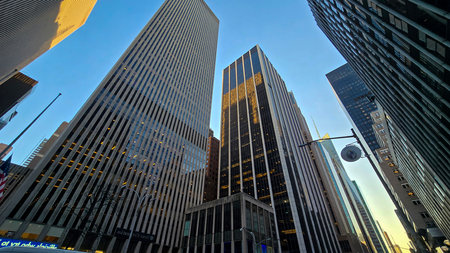 City skyline featuring modern and classic architecture, with prominent skyscrapers and urban...