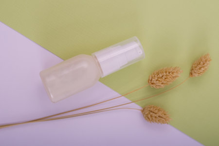 fresh blank spray product bottle with very aesthetic background, good for branding advertisement campaign or Elegant beauty product shot suitable for makeup, spa, and lifestyle branding with a dreamy mood.の写真素材