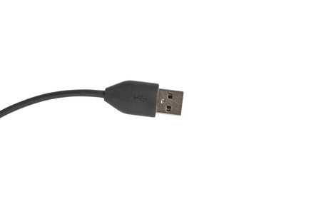 USB cable is black, isolated on white backgroundの写真素材
