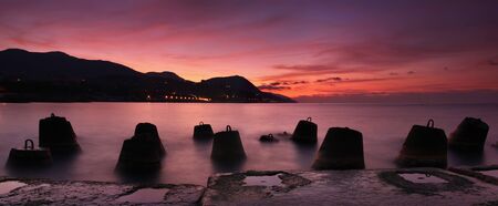 Panorama of the sunset on the seaの写真素材