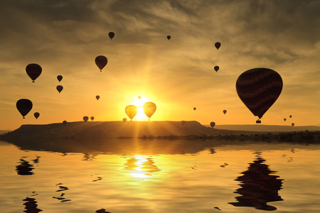 Balloons in Cappadocia at dawn sky backgroundの写真素材