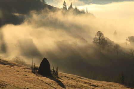 View of misty fog mountains in autumn, Carpathians, Ukraine の写真素材