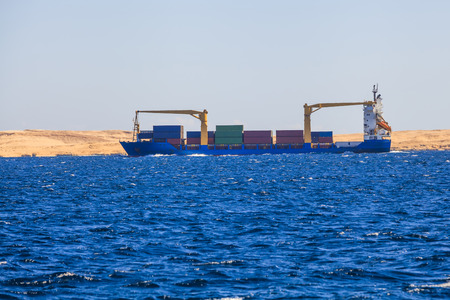 Cargo ship with containers. Off the coast of Egypt.