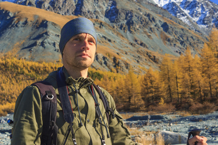 Male traveler from back in the mountains