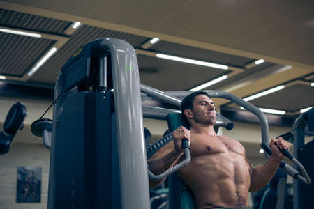 workout with heavy loads in the gym