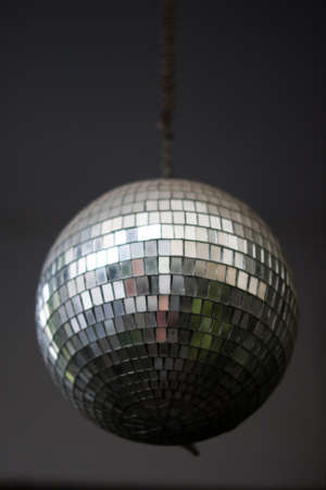 image of the mirror  ball on a gray ceilingの写真素材