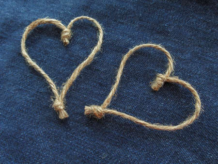 Sign two hearts of twine in denim