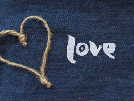 Sign heart of twine in denimの写真素材