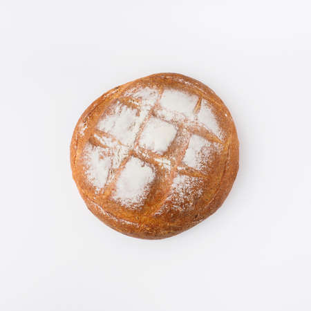 Round white bread isolated on white background. Top viewの写真素材