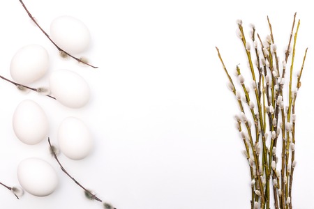 Easter holiday concept. Flowering willow branches and white eggsの写真素材