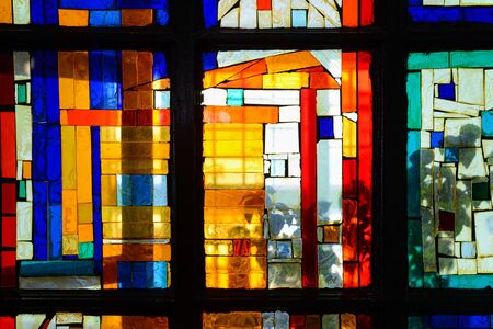 Abstract multicolored stained glass window. Beautiful pattern with geometric linesの写真素材