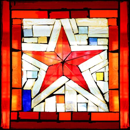 Abstract color shapes, stained glass window. Red star in the square. Colorful geometric backgroundの写真素材