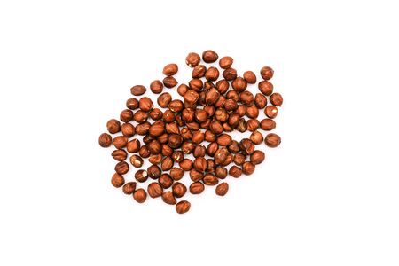 Hazelnuts isolated on a white background. A handful of ripe nuts. Flat lay, top viewの写真素材