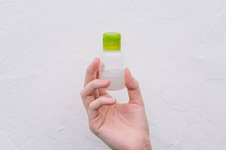 Antiseptic in the hand of man. Protection against germs, bacteria and viruses. Prevention of infectious diseasesの写真素材