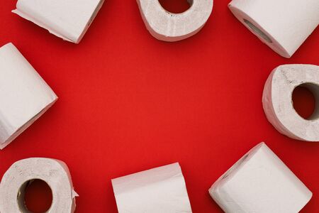 Rolls of toilet paper on a colored background with copy space. Soft white paper. Toiletries and accessories. Hygiene conceptの写真素材