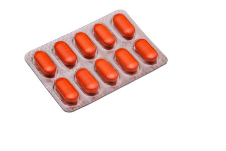 Pills in pack isolated on white background. A drug for the treatment of diseases. Medicine and pharmaceuticals.の写真素材