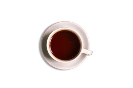 White cup and saucer isolated on a white background. Hot tea drink. Black teaの写真素材