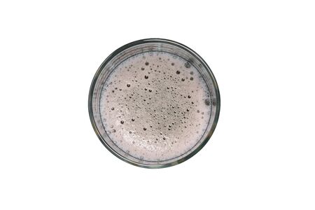 Glass of beer isolated on a white background. A top view of a flat layoutの写真素材
