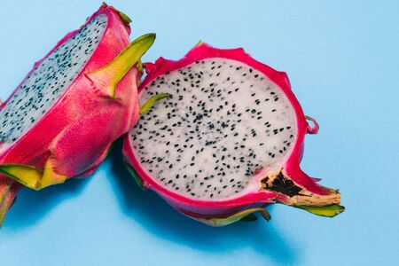 Pitaya fruit close-up on a colored background. Minimal concept of fresh fruit.の写真素材
