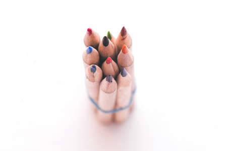 Colored pencils isolated on a white background. Wooden pencils close-up.の写真素材