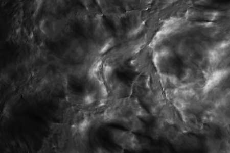 Abstract dark background with haze. Blurred spots on a black backgroundの写真素材