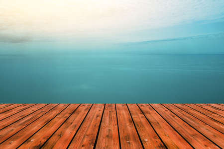 Seascape with a wide horizon of sky and sea. Skyline. The turquoise surface of the sea or ocean. Sunrise or sunset over the seaの写真素材