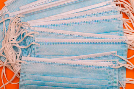 Disposable medical masks. Protecting people from bacteria and viruses. Respiratory protection of the respiratory system. Medical supplies. Surgical maskの写真素材
