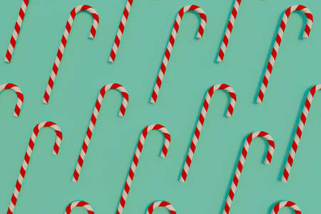 Christmas background. Sweet stick with red and white spiral. New year concept. Flat lay, pattern. 3D renderingの写真素材