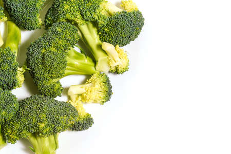 Broccoli isolated on white with copy space. Nutrition, diet and weight loss concept. Top view, flat layの写真素材