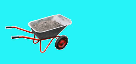 Construction trolley isolated on bright background. The concept of construction, repair and work on a garden plotの写真素材