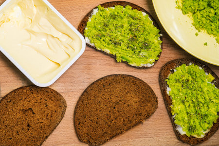 Avocado sandwiches. A simple vegetarian meal. Top view, flat layの写真素材
