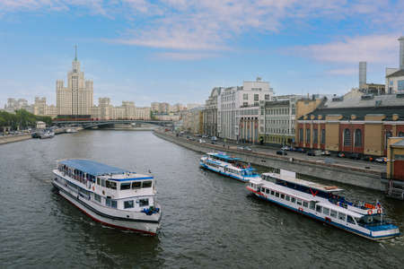 Tourist ship is sailing along the Moscow river. The river tram carries passengers. Travel and tourism. Sights of Moscow. Moscow, Russia, 09 may 2019.のeditorial素材